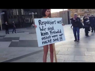 swiss exhibitionist artist milo moir held a protest against sex terror on a square in the center of cologne.